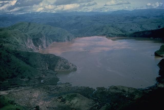 Lake Nyos is the most renowned of the numerous maars and basaltic cinder cones associated with the deeply dissected Mount Oku massif.